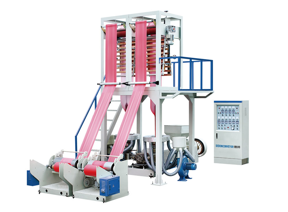 Twin die head film blowing machine